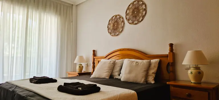 Upstairs bedroom with balcony